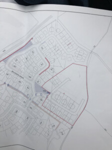 Housing development layout drawing with a site boundary marked in red